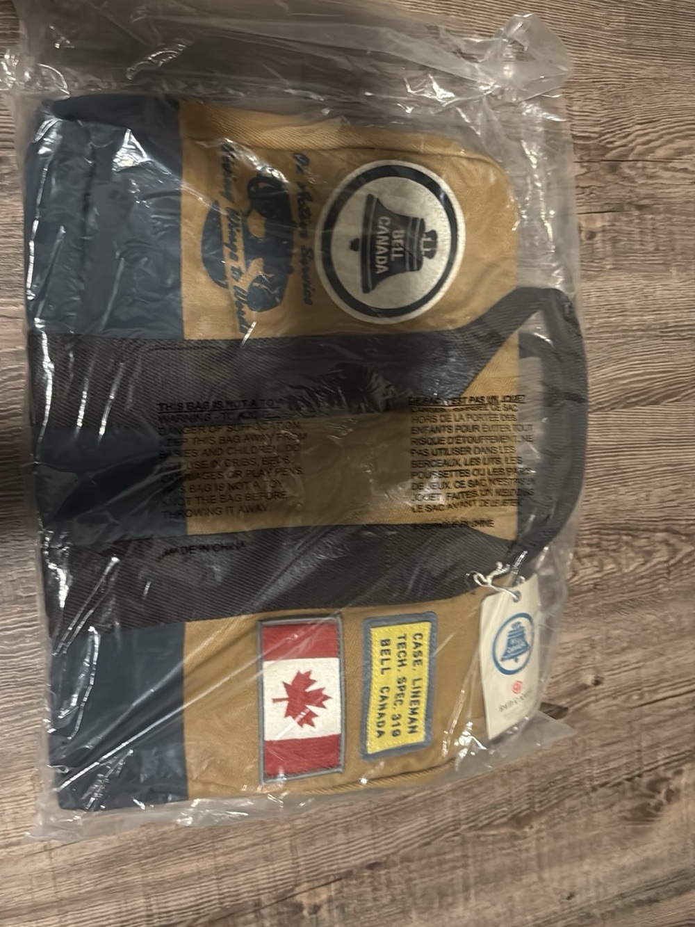 Bell Canada Patch Duffel Bag in Tan & Navy